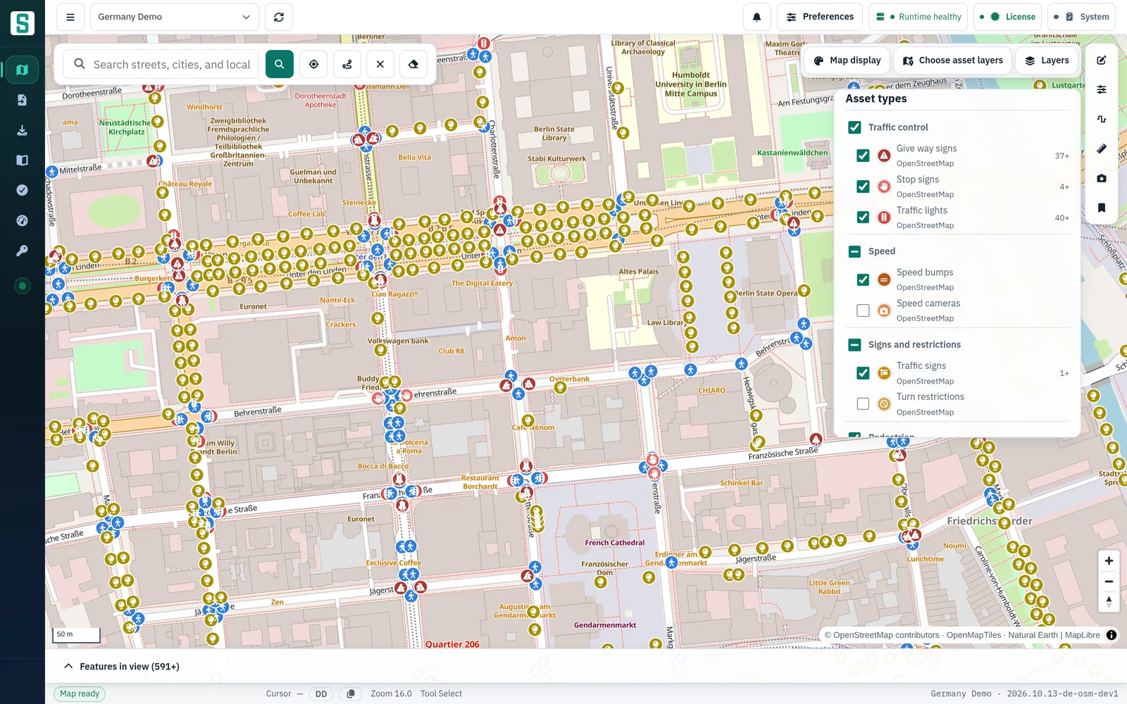 Layers panel on the Asset layers tab with traffic control, speed and sign categories ticked, and the matching symbols on a Berlin street map